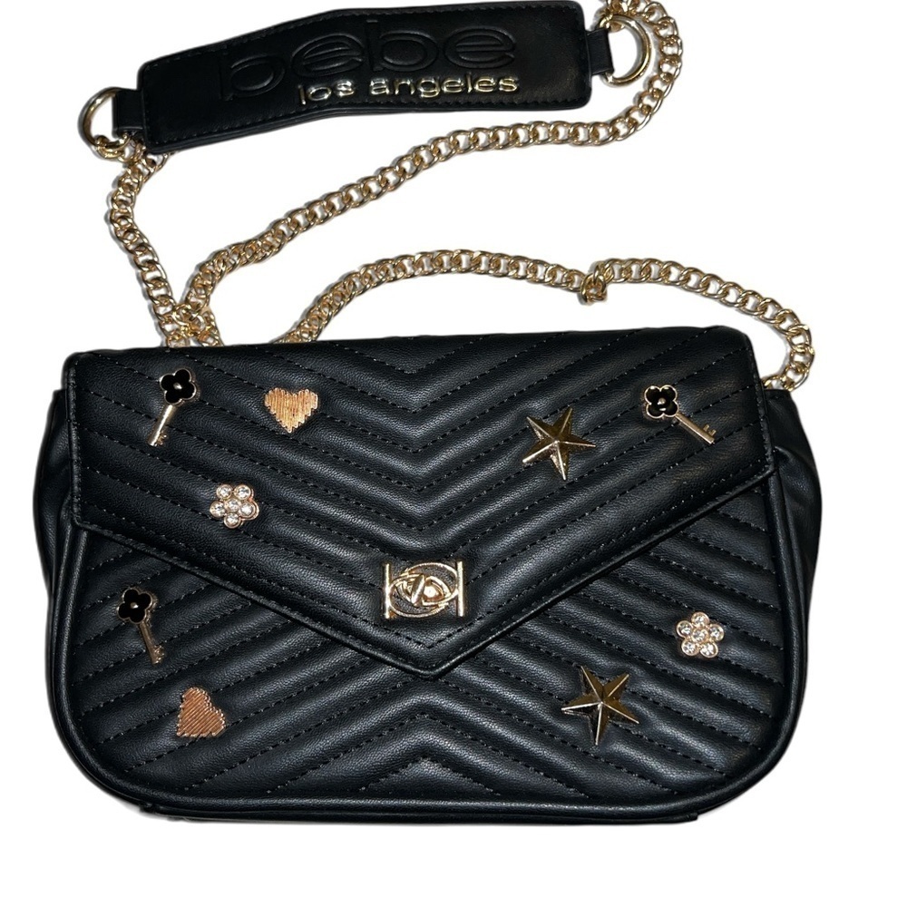Black crossbody w/ charms .